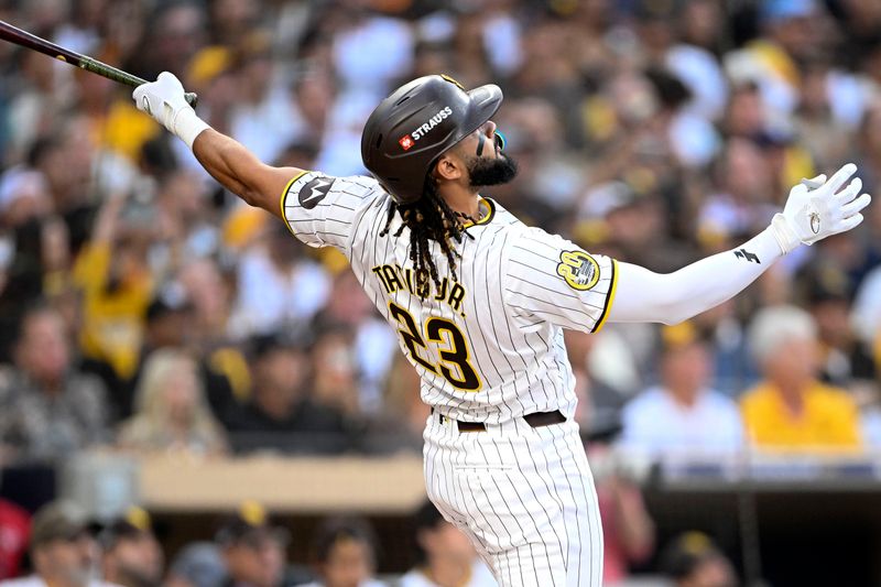 Oct 1, 2024; San Diego, California, USA; San Diego Padres outfielder Fernando Tatis Jr. (23) reacts after hitting a two run home run against the Atlanta Braves during the first inning in game one of the Wildcard round for the 2024 MLB Playoffs at Petco Park. Mandatory Credit: Denis Poroy-Imagn Images