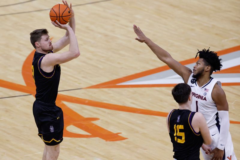 Dec 28, 2022; Charlottesville, Virginia, USA; Albany Great Danes forward Trey Hutcheson (3) shoots the ball over Virginia Cavaliers forward Jayden Gardner (1) in the first half at John Paul Jones Arena. Mandatory Credit: Geoff Burke-USA TODAY Sports