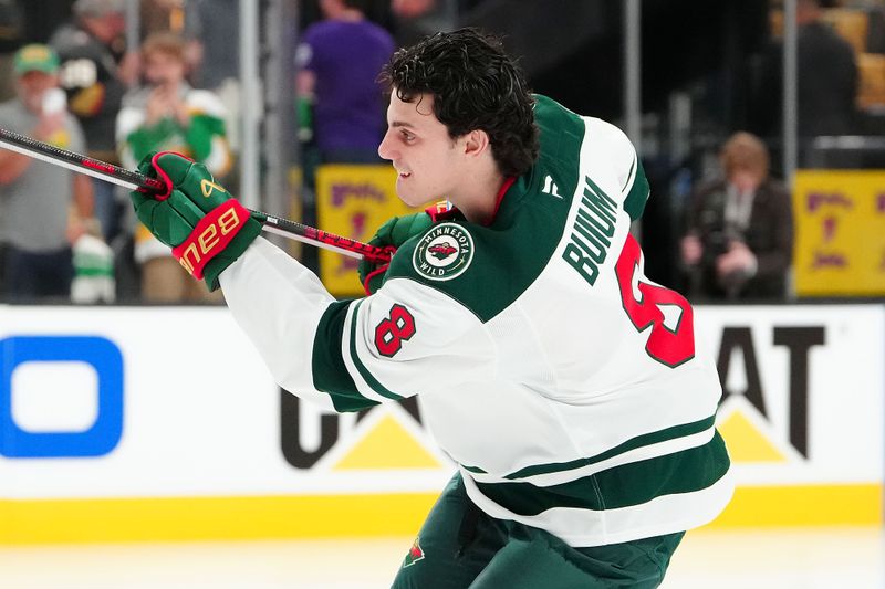 Apr 20, 2025; Las Vegas, Nevada, USA; Minnesota Wild defenseman Zeev Buium (8) takes a rookie lap before making his NHL debut against the Vegas Golden Knights in game one of the first round of the 2025 Stanley Cup Playoffs at T-Mobile Arena. Mandatory Credit: Stephen R. Sylvanie-Imagn Images