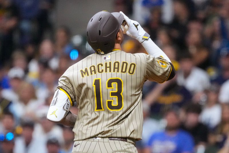 Jun 6, 2025; Milwaukee, Wisconsin, USA;  San Diego Padres third baseman Manny Machado (13) celebrates after hitting a home run during the eighth inning against the Milwaukee Brewers at American Family Field. Mandatory Credit: Jeff Hanisch-Imagn Images