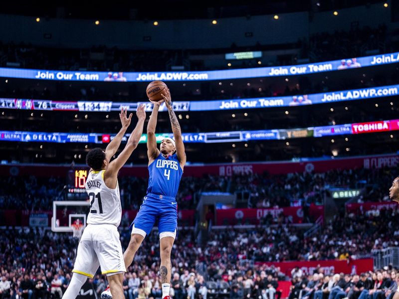 LOS ANGELES, CA - APRIL 12: Brandon Boston Jr. #4 of the LA Clippers shoots the ball during the game against the Utah Jazz on April 12, 2024 at Crypto.Com Arena in Los Angeles, California. NOTE TO USER: User expressly acknowledges and agrees that, by downloading and/or using this Photograph, user is consenting to the terms and conditions of the Getty Images License Agreement. Mandatory Copyright Notice: Copyright 2024 NBAE (Photo by Tyler Ross/NBAE via Getty Images)