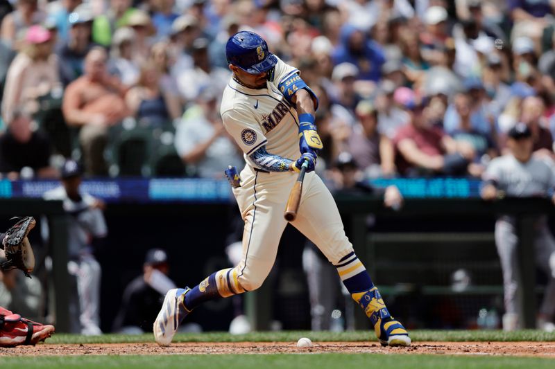 Jun 30, 2024; Seattle, Washington, USA; Seattle Mariners center fielder Julio Rodríguez (44) hits an RBI a fielders choice during the fifth inning against the Minnesota Twins at T-Mobile Park. Mandatory Credit: John Froschauer-USA TODAY Sports