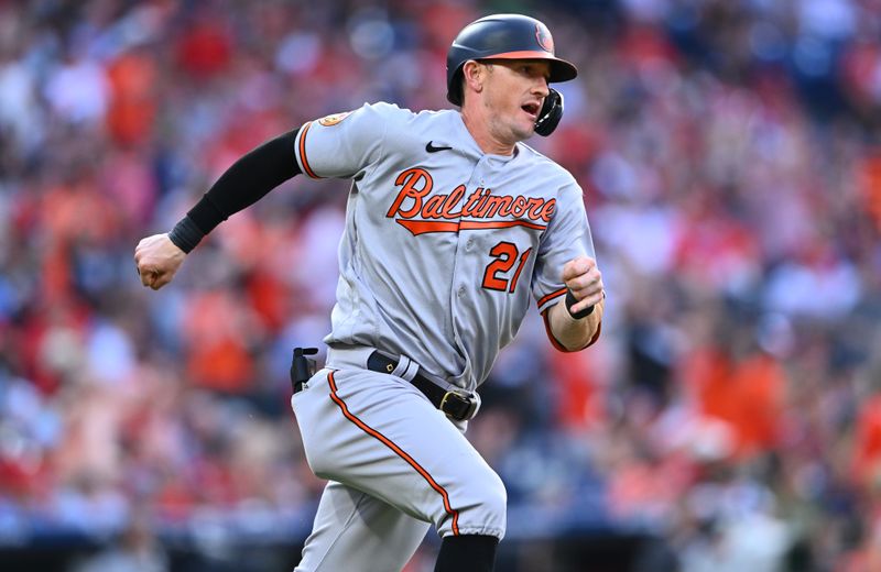 Jul 25, 2023; Philadelphia, Pennsylvania, USA; Baltimore Orioles outfielder Austin Hays (21) advances toward first after hitting an RBI double against the Philadelphia Phillies in the second inning at Citizens Bank Park. Mandatory Credit: Kyle Ross-USA TODAY Sports