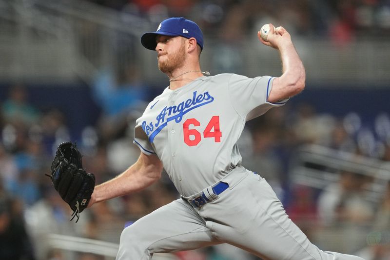 Sep 7, 2023; Miami, Florida, USA; Los Angeles Dodgers relief pitcher Caleb Ferguson (64) pitches in the eighth inning against the Miami Marlins at loanDepot Park. Mandatory Credit: Jim Rassol-USA TODAY Sports