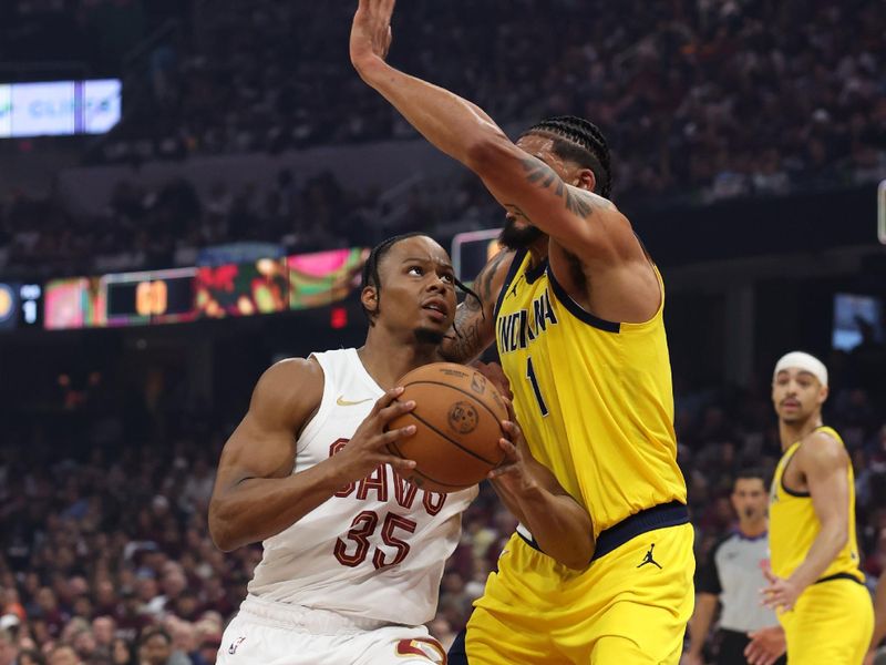 CLEVELAND, OH - MAY 4: Isaac Okoro #35 of the Cleveland Cavaliers drives to the basket during the game against the Indiana Pacers during Round 2 Game 1 of the 2025 NBA Playoffs on May 4, 2025 at Rocket Mortgage FieldHouse in Cleveland, Ohio. NOTE TO USER: User expressly acknowledges and agrees that, by downloading and/or using this Photograph, user is consenting to the terms and conditions of the Getty Images License Agreement. Mandatory Copyright Notice: Copyright 2025 NBAE (Photo by  Lauren Leigh Bacho/NBAE via Getty Images)