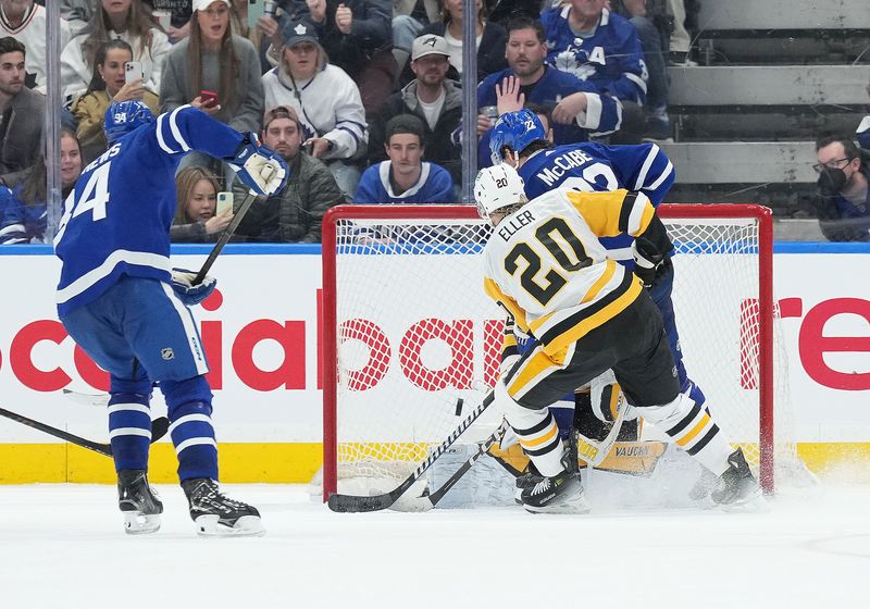 Apr 8, 2024; Toronto, Ontario, CAN; Toronto Maple Leafs defenseman Jake McCabe (22) scores the winning goal against the Pittsburgh Penguins during the overtime period at Scotiabank Arena. Mandatory Credit: Nick Turchiaro-USA TODAY Sports