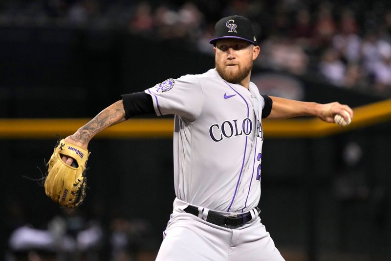 Sep 5, 2023; Phoenix, Arizona, USA; Colorado Rockies starting pitcher Kyle Freeland (21) throws against the Arizona Diamondbacks in the first inning at Chase Field. Mandatory Credit: Rick Scuteri-USA TODAY Sports