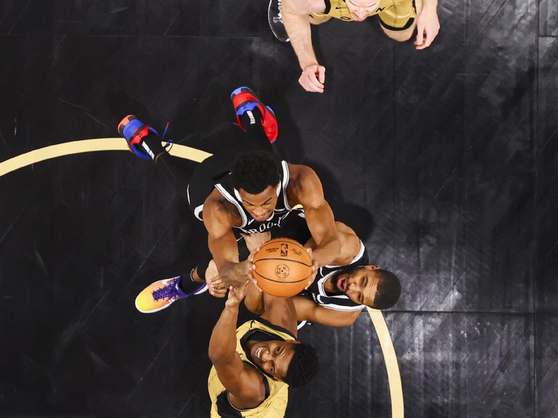 TORONTO, CANADA - FEBRUARY 22: Players go up for the rebound during the game on February 22, 2024 at the Scotiabank Arena in Toronto, Ontario, Canada.  NOTE TO USER: User expressly acknowledges and agrees that, by downloading and or using this Photograph, user is consenting to the terms and conditions of the Getty Images License Agreement.  Mandatory Copyright Notice: Copyright 2024 NBAE (Photo by Vaughn Ridley/NBAE via Getty Images)