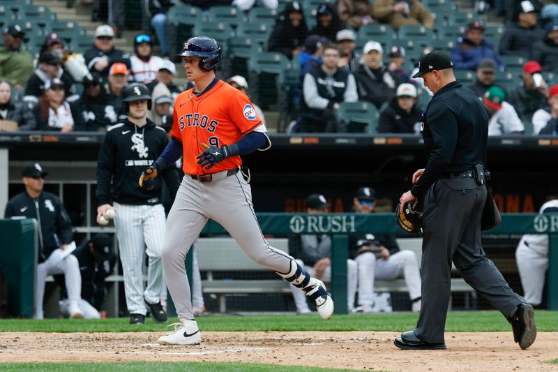May 4, 2025; Chicago, Illinois, USA; Houston Astros right fielder Zach Dezenzo (9) crosses home plate after hitting a two-run home run against the Chicago White Sox during the fifth inning at Rate Field. Mandatory Credit: Kamil Krzaczynski-Imagn Images