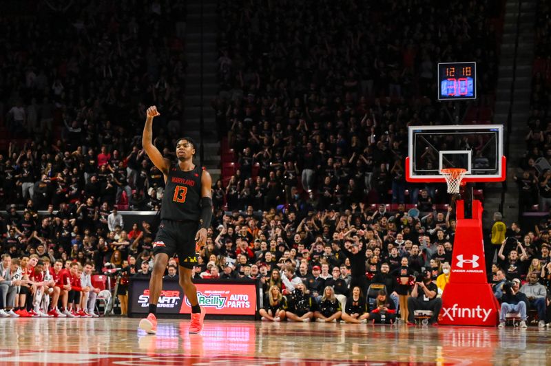 Jan 25, 2023; College Park, Maryland, USA;  Maryland Terrapins guard Hakim Hart (13) reacts after hitting a three point shot during the second half against the Wisconsin Badgers at Xfinity Center. Mandatory Credit: Tommy Gilligan-USA TODAY Sports