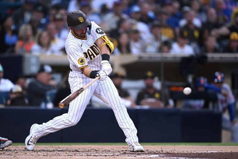 Jul 8, 2023; San Diego, California, USA; San Diego Padres second baseman Matthew Batten (17) hits a two-run home run against the New York Mets during the second inning at Petco Park. Mandatory Credit: Orlando Ramirez-USA TODAY Sports