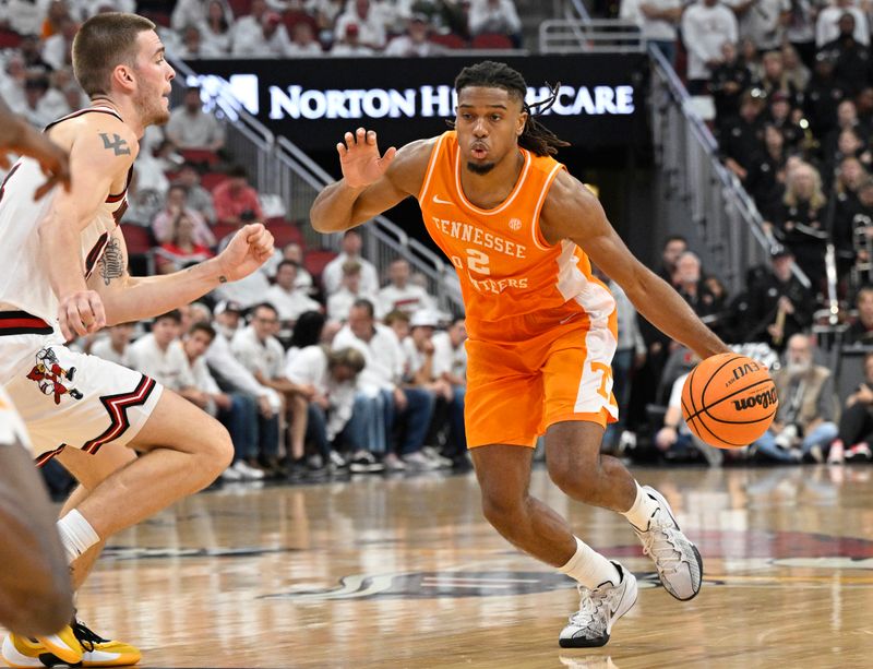 Nov 9, 2024; Louisville, Kentucky, USA;  Tennessee Volunteers guard Chaz Lanier (2) dribbles against Louisville Cardinals forward Noah Waterman (93) during the first half at KFC Yum! Center. Tennessee defeated Louisville 77-55. Mandatory Credit: Jamie Rhodes-Imagn Images