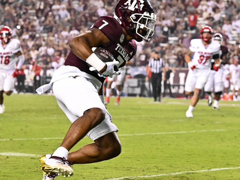 Sep 2, 2023; College Station, Texas, USA; Texas A&M Aggies wide receiver Moose Muhammad III (7) catches a pass during the fourth quarter against New Mexico Lobos at Kyle Field. Mandatory Credit: Maria Lysaker-USA TODAY Sports