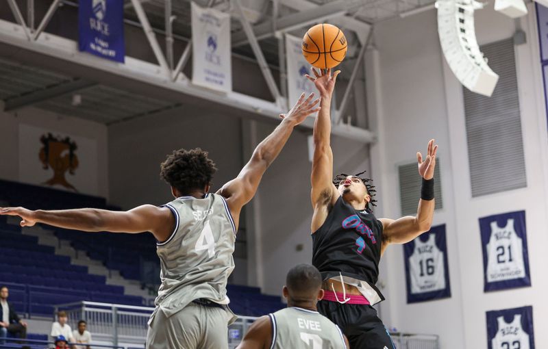 Jan 24, 2024; Houston, Texas, USA; Florida Atlantic Owls guard Bryan Greenlee (4) shoots the ball as Rice Owls guard Anthony Selden (4) defends during the first half at Tudor Fieldhouse. Mandatory Credit: Troy Taormina-USA TODAY Sports