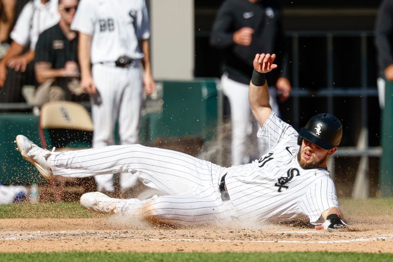 Sep 26, 2024; Chicago, Illinois, USA; Chicago White Sox outfielder Zach DeLoach (31) scores against the Los Angeles Angels during the fifth inning at Guaranteed Rate Field. Mandatory Credit: Kamil Krzaczynski-Imagn Images