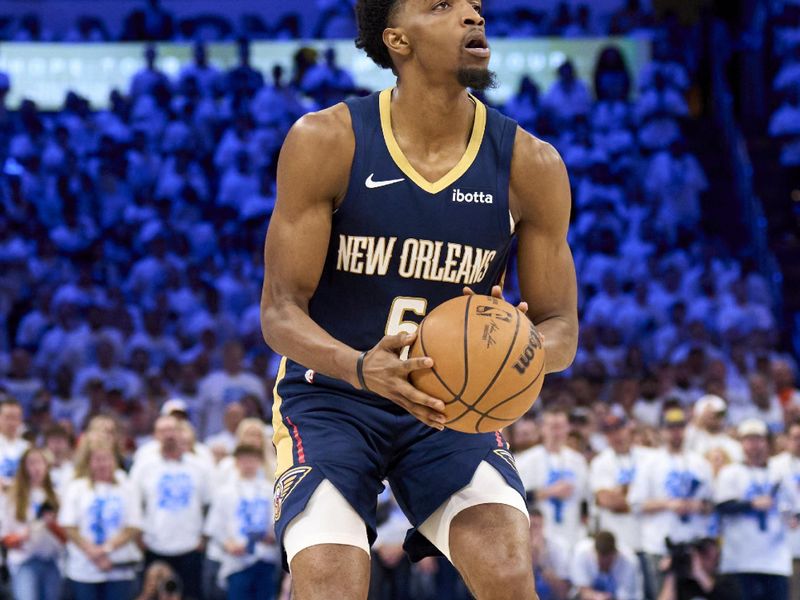 OKLAHOMA CITY, OKLAHOMA - APRIL 21: Herbert Jones #5 of the New Orleans Pelicans shoots the ball against the Oklahoma City Thunder in game one of the Western Conference First Round Playoffs at the Paycom Center on April 21, 2024 in Oklahoma City, Oklahoma. NOTE TO USER: User expressly acknowledges and agrees that, by downloading and or using this photograph, User is consenting to the terms and conditions of the Getty Images License Agreement.  (Photo by Cooper Neill/Getty Images)