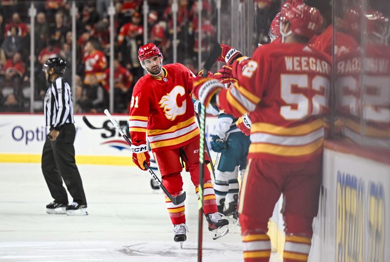 Feb 15, 2024; Calgary, Alberta, CAN; Calgary Flames center Nazem Kadri (91) celebrates after scoring a goal against the San Jose Sharks during the first period at Scotiabank Saddledome. Mandatory Credit: Brett Holmes-USA TODAY Sports