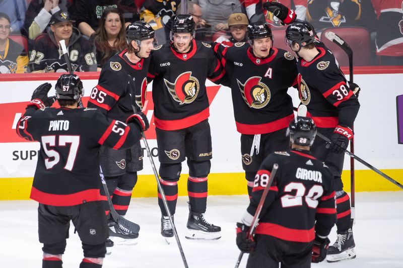 Mar 12, 2024; Ottawa, Ontario, CAN; The Ottawa Senators celebrate a goal scored by right wing Drake Batherson (19) in overtime against the Pittsburgh Penguins at  the Canadian Tire Centre. Mandatory Credit: Marc DesRosiers-USA TODAY Sports