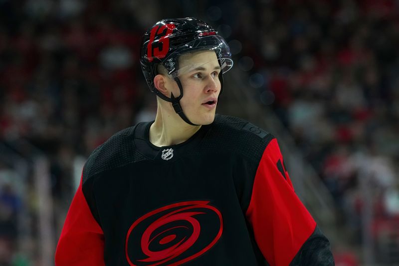 Mar 11, 2023; Raleigh, North Carolina, USA; Carolina Hurricanes right wing Jesse Puljujarvi (13) looks on against the Vegas Golden Knights during the first period at PNC Arena. Mandatory Credit: James Guillory-USA TODAY Sports