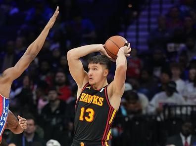 PHILADELPHIA, PA - DECEMBER 8: Bogdan Bogdanovic #13 of the Atlanta Hawks passes the ball during the game against the Philadelphia 76ers on December 8, 2023 at the Wells Fargo Center in Philadelphia, Pennsylvania NOTE TO USER: User expressly acknowledges and agrees that, by downloading and/or using this Photograph, user is consenting to the terms and conditions of the Getty Images License Agreement. Mandatory Copyright Notice: Copyright 2023 NBAE (Photo by Jesse D. Garrabrant/NBAE via Getty Images)