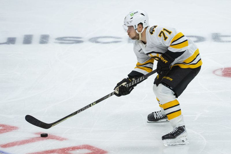 Nov 13, 2025; Ottawa, Ontario, CAN; Boston Bruins left wing Viktor Arvidsson (71) skates with the puck in the third period against the Ottawa Senators at the Canadian Tire Centre. Mandatory Credit: Marc DesRosiers-IMAGN Images