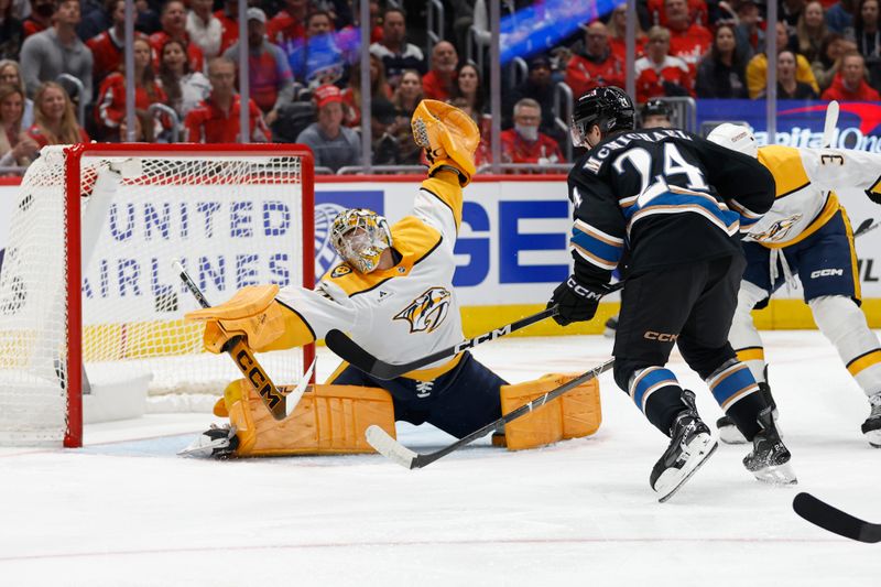 Nov 6, 2024; Washington, District of Columbia, USA; Washington Capitals center Connor McMichael (24) scores a goal on Nashville Predators goaltender Juuse Saros (74) in the first period at Capital One Arena. Mandatory Credit: Geoff Burke-Imagn Images