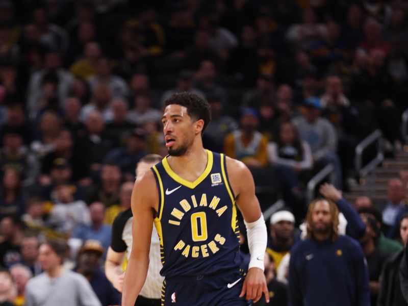 INDIANAPOLIS, IN - FEBRUARY 24: Tyrese Haliburton #0 of the Indiana Pacers looks to pass the ball during the game against the Denver Nuggets on February 24, 2025 at Gainbridge Fieldhouse in Indianapolis, Indiana. NOTE TO USER: User expressly acknowledges and agrees that, by downloading and or using this Photograph, user is consenting to the terms and conditions of the Getty Images License Agreement. Mandatory Copyright Notice: Copyright 2025 NBAE (Photo by Pepper Robinson/NBAE via Getty Images)
