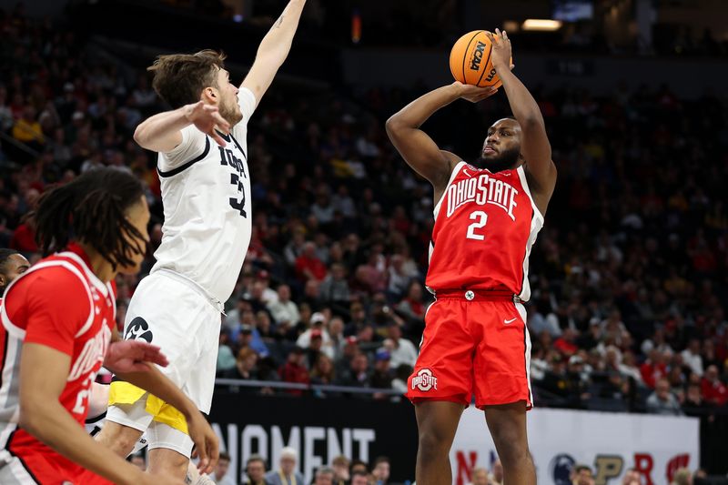 Mar 14, 2024; Minneapolis, MN, USA; Ohio State Buckeyes guard Bruce Thornton (2) shoots as Iowa Hawkeyes forward Owen Freeman (32) defends during the second half at Target Center. Mandatory Credit: Matt Krohn-USA TODAY Sports