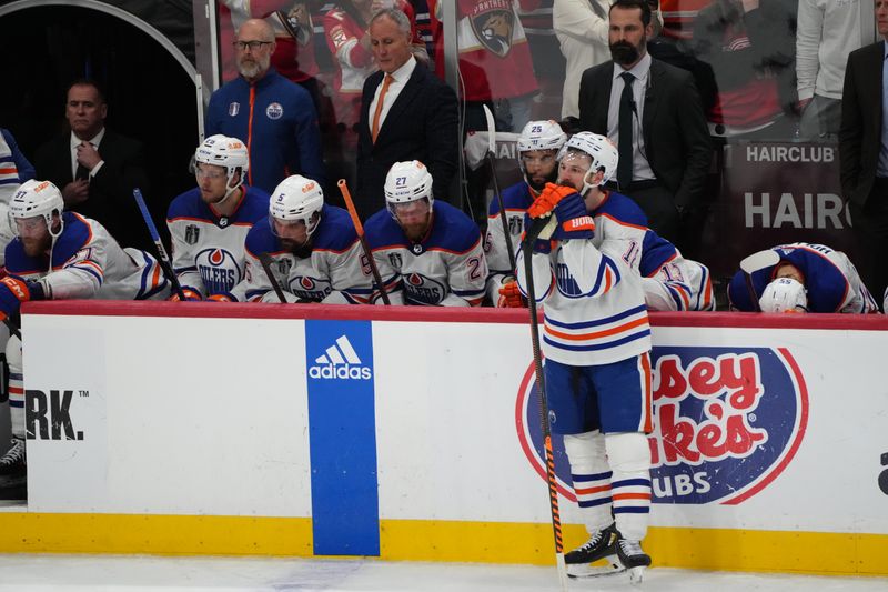 Jun 24, 2024; Sunrise, Florida, USA; Edmonton Oilers react to the loss against the Florida Panthers in game seven of the 2024 Stanley Cup Final at Amerant Bank Arena. Mandatory Credit: Jim Rassol-USA TODAY Sports
