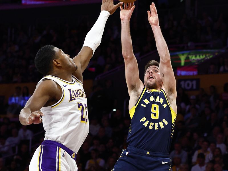 LOS ANGELES, CALIFORNIA - MARCH 24:  T.J. McConnell #9 of the Indiana Pacers takes a shot against Rui Hachimura #28 of the Los Angeles Lakers in the first half at Crypto.com Arena on March 24, 2024 in Los Angeles, California.  NOTE TO USER: User expressly acknowledges and agrees that, by downloading and/or using this photograph, user is consenting to the terms and conditions of the Getty Images License Agreement.  (Photo by Ronald Martinez/Getty Images)