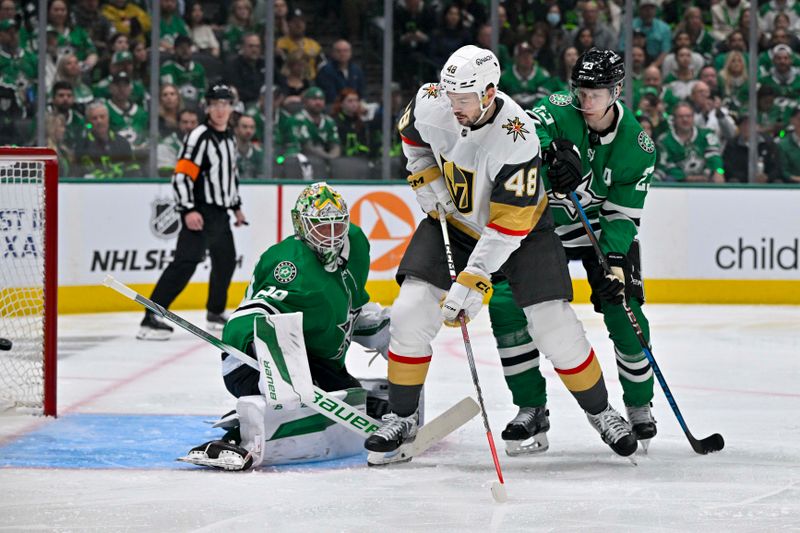 Apr 22, 2024; Dallas, Texas, USA; Vegas Golden Knights center Tomas Hertl (48) watches as a shot by Vegas Golden Knights right wing Mark Stone (not pictured) gets past Dallas Stars goaltender Jake Oettinger (29) and defenseman Esa Lindell (23) looks on during the first period in game one of the first round of the 2024 Stanley Cup Playoffs at the American Airlines Center. Mandatory Credit: Jerome Miron-USA TODAY Sports