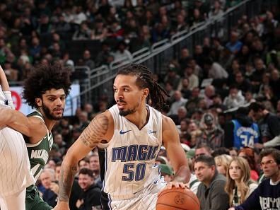 MILWAUKEE, WI - DECEMBER 21:  Cole Anthony #50 of the Orlando Magic handles the ball during the game against the Milwaukee Bucks on December 21, 2023 at the Fiserv Forum Center in Milwaukee, Wisconsin. NOTE TO USER: User expressly acknowledges and agrees that, by downloading and or using this Photograph, user is consenting to the terms and conditions of the Getty Images License Agreement. Mandatory Copyright Notice: Copyright 2023 NBAE (Photo by Gary Dineen/NBAE via Getty Images).