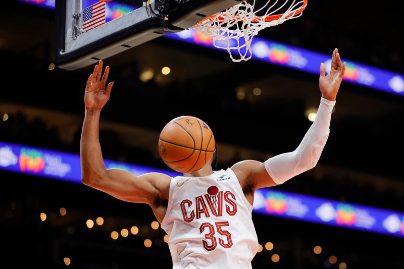 ATLANTA, GEORGIA - JANUARY 20: Isaac Okoro #35 of the Cleveland Cavaliers slam dunks the ball against the Atlanta Hawks during the first half at State Farm Arena on January 20, 2024 in Atlanta, Georgia. NOTE TO USER: User expressly acknowledges and agrees that, by downloading and or using this photograph, User is consenting to the terms and conditions of the Getty Images License Agreement. (Photo by Alex Slitz/Getty Images)