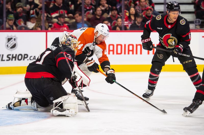 Oct 14, 2023; Ottawa, Ontario, CAN; Philadelphia Flyers left wing Nicholas Deslauriers tries to deflect a shot on Ottawa Senators goalie Anton Forsberg (31) in the second period at the Canadian Tire Centre. Mandatory Credit: Marc DesRosiers-USA TODAY Sports