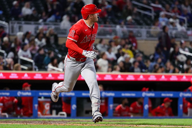 Apr 25, 2025; Minneapolis, Minnesota, USA; Los Angeles Angels designated hitter Mike Trout (27) watches his solo home run against the Minnesota Twins during the seventh inning at Target Field. Mandatory Credit: Matt Krohn-Imagn Images