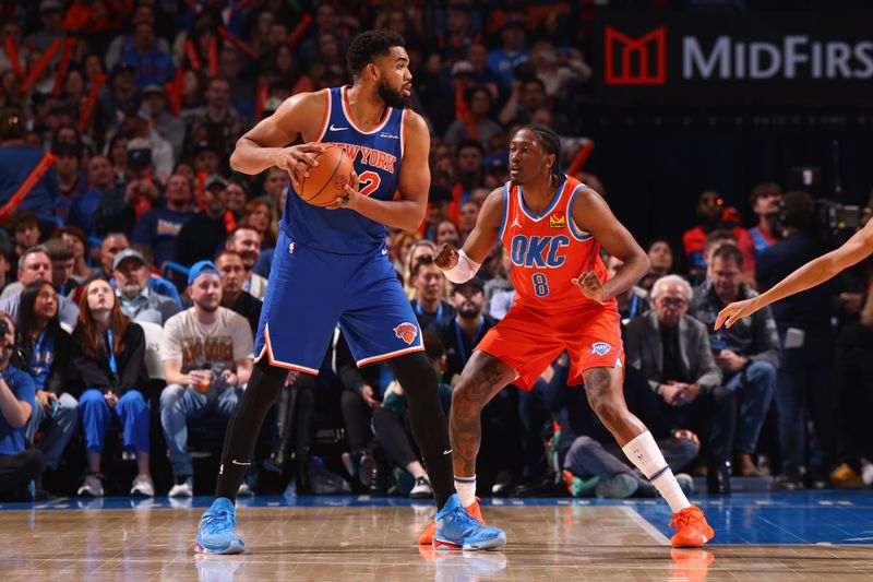 OKLAHOMA CITY, OK - JANUARY 3:  Karl-Anthony Towns #32 of the New York Knicks dribbles the ball during the game against the Oklahoma City Thunder on January 3, 2025 at Paycom Center in Oklahoma City, Oklahoma. NOTE TO USER: User expressly acknowledges and agrees that, by downloading and or using this photograph, User is consenting to the terms and conditions of the Getty Images License Agreement. Mandatory Copyright Notice: Copyright 2025 NBAE (Photo by Zach Beeker/NBAE via Getty Images)