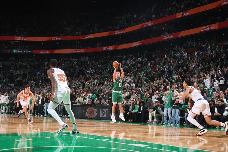 BOSTON, MA - OCTOBER 22: Payton Pritchard #11 of the Boston Celtics shoots a three point basket during the game against the New York Knicks on October 22, 2024 at TD Garden in Boston, Massachusetts. NOTE TO USER: User expressly acknowledges and agrees that, by downloading and or using this Photograph, user is consenting to the terms and conditions of the Getty Images License Agreement. Mandatory Copyright Notice: Copyright 2024 NBAE (Photo by Nathaniel S. Butler/NBAE via Getty Images)