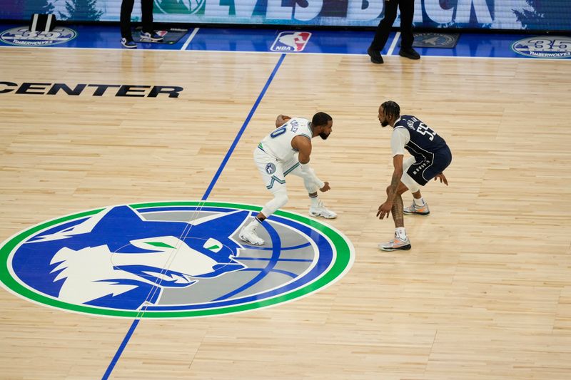 MINNEAPOLIS, MN -  MAY 22: Mike Conley #10 of the Minnesota Timberwolves dribbles the ball during the game against the Dallas Mavericks during Game 1 of the Western Conference Finals of the 2024 NBA Playoffs on January 1, 2024 at Target Center in Minneapolis, Minnesota. NOTE TO USER: User expressly acknowledges and agrees that, by downloading and or using this Photograph, user is consenting to the terms and conditions of the Getty Images License Agreement. Mandatory Copyright Notice: Copyright 2024 NBAE (Photo by Jordan Johnson/NBAE via Getty Images)