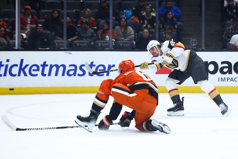 Nov 13, 2024; Anaheim, California, USA; Vegas Golden Knights right wing Alexander Holtz (26) shoots against the Anaheim Ducks during the first period of a hockey game at Honda Center. Mandatory Credit: Jessica Alcheh-Imagn Images