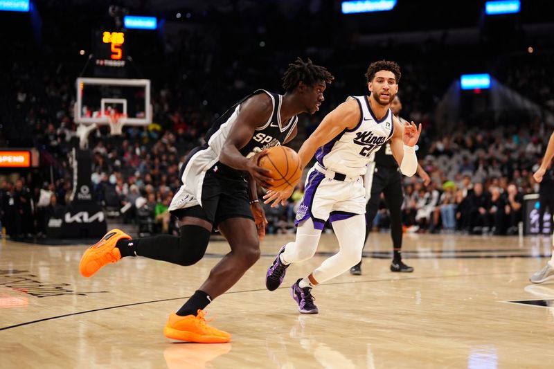 SAN ANTONIO, TX - DECEMBER 6: Sidy Cissoko #25 of the San Antonio Spurs dribbles the ball during the game against the Sacramento Kings on December 6, 2024 at the Frost Bank Center in San Antonio, Texas. NOTE TO USER: User expressly acknowledges and agrees that, by downloading and or using this photograph, user is consenting to the terms and conditions of the Getty Images License Agreement. Mandatory Copyright Notice: Copyright 2024 NBAE (Photos by Darren Carroll/NBAE via Getty Images)