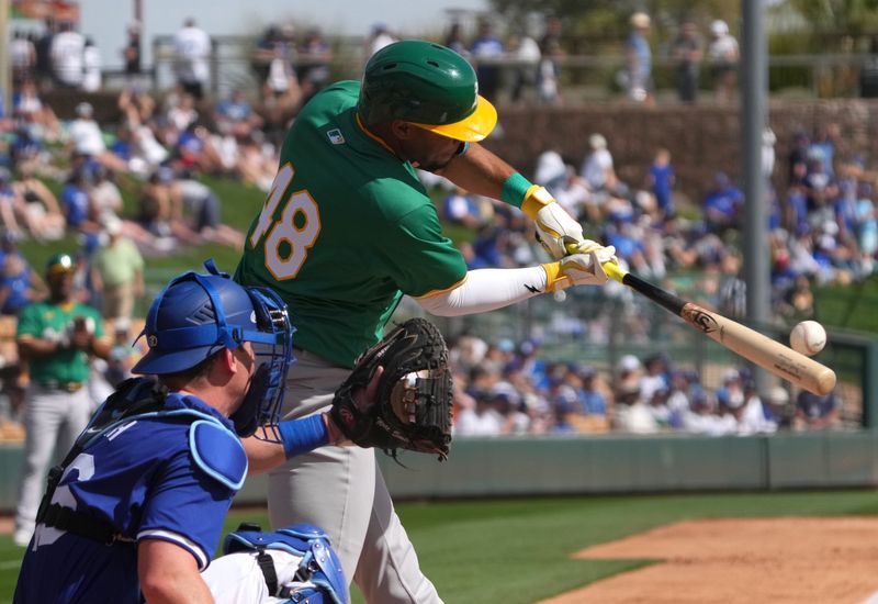 Feb 25, 2024; Phoenix, Arizona, USA; Oakland Athletics shortstop Darell Hernaiz (38) bats against the Los Angeles Dodgers during the second inning at Camelback Ranch-Glendale. Mandatory Credit: Joe Camporeale-USA TODAY Sports