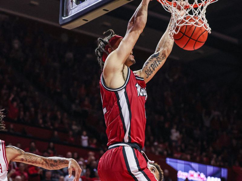 Dec 3, 2022; Piscataway, New Jersey, USA; Rutgers Scarlet Knights guard Caleb McConnell (22) dunks the ball against Indiana Hoosiers guard CJ Gunn (11) during the second half at Jersey Mike's Arena. Mandatory Credit: Vincent Carchietta-USA TODAY Sports