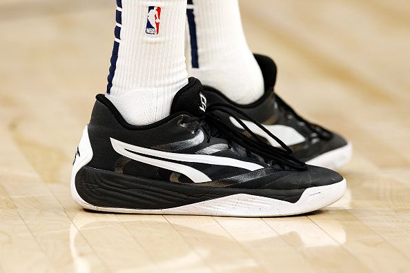 MINNEAPOLIS, MINNESOTA - NOVEMBER 01: A view of the sneakers worn by Michael Porter Jr. #1 of the Denver Nuggets against the Minnesota Timberwolves in the third quarter at Target Center on November 01, 2023 in Minneapolis, Minnesota. The Timberwolves defeated the Nuggets 110-89. NOTE TO USER: User expressly acknowledges and agrees that, by downloading and or using this photograph, User is consenting to the terms and conditions of the Getty Images License Agreement. (Photo by David Berding/Getty Images)