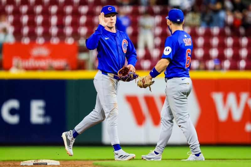 May 23, 2025; Cincinnati, Ohio, USA; Chicago Cubs outfielder Pete Crow-Armstrong (4) high fives third baseman Matt Shaw (6) after the victory over the Cincinnati Reds at Great American Ball Park. Mandatory Credit: Katie Stratman-Imagn Images