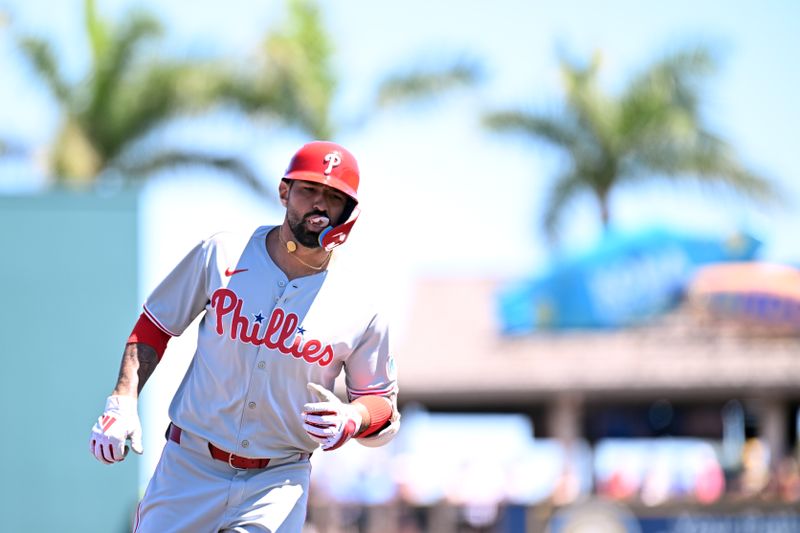 Mar 18, 2025; Bradenton, Florida, USA; Philadelphia Phillies designated hitter Nick Castellanos (8) rounds the bases after hitting a solo home run in the first inning against the Pittsburgh Pirates during spring training at LECOM Park. Mandatory Credit: Jonathan Dyer-Imagn Images