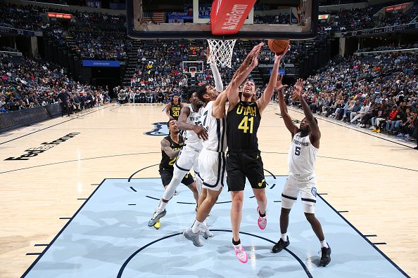 MEMPHIS, TN - NOVEMBER 29:  Kelly Olynyk #41 of the Utah Jazz goes to the basket during the game on November 29, 2023 at FedExForum in Memphis, Tennessee. NOTE TO USER: User expressly acknowledges and agrees that, by downloading and or using this photograph, User is consenting to the terms and conditions of the Getty Images License Agreement. Mandatory Copyright Notice: Copyright 2023 NBAE (Photo by Joe Murphy/NBAE via Getty Images)