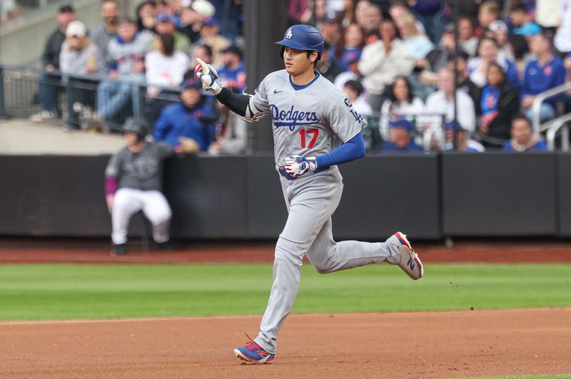 May 25, 2025; New York City, New York, USA; Los Angeles Dodgers designated hitter Shohei Ohtani (17) rounds the bases after a solo home run during the first inning against the New York Mets at Citi Field. Mandatory Credit: Vincent Carchietta-Imagn Images