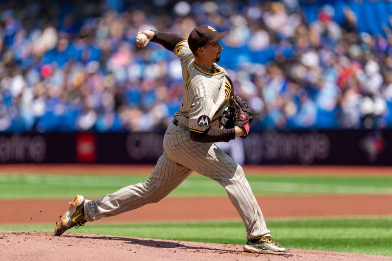 Jul 20, 2023; Toronto, Ontario, CAN; San Diego Padres starting pitcher Blake Snell (4) pitches to the Toronto Blue Jays during the first inning at Rogers Centre. Mandatory Credit: Kevin Sousa-USA TODAY Sports