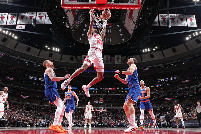 CHICAGO, IL - APRIL 9: Dalen Terry #25 of the Chicago Bulls dunks the ball during the game against the New York Knicks on April 9, 2024 at United Center in Chicago, Illinois. NOTE TO USER: User expressly acknowledges and agrees that, by downloading and or using this photograph, User is consenting to the terms and conditions of the Getty Images License Agreement. Mandatory Copyright Notice: Copyright 2024 NBAE (Photo by Jeff Haynes/NBAE via Getty Images)