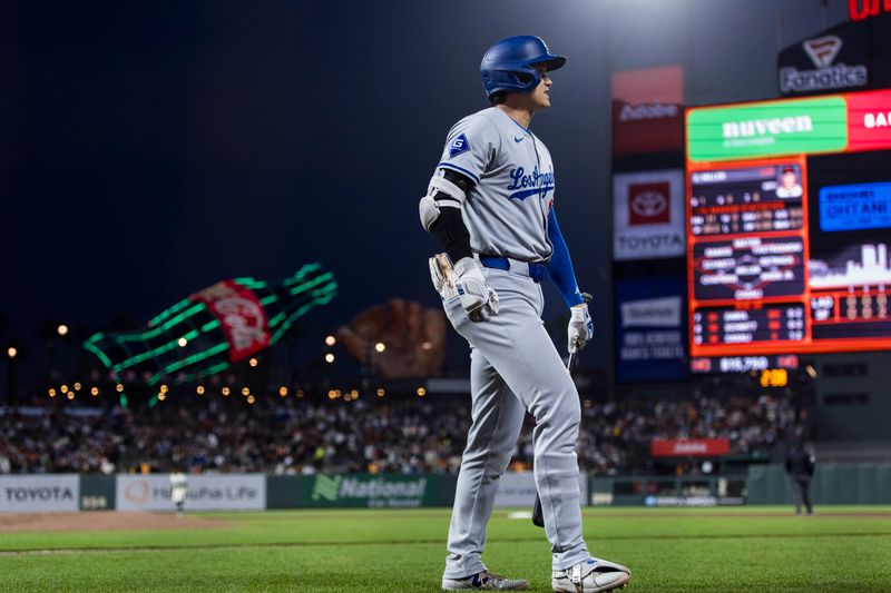 May 15, 2024; San Francisco, California, USA; Los Angeles Dodgers designated hitter Shohei Ohtani (17) returns to the dugout after striking out against the San Francisco Giants during the seventh inning at Oracle Park. Mandatory Credit: John Hefti-USA TODAY Sports